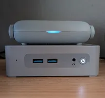 N100 mini pc with a small router on top